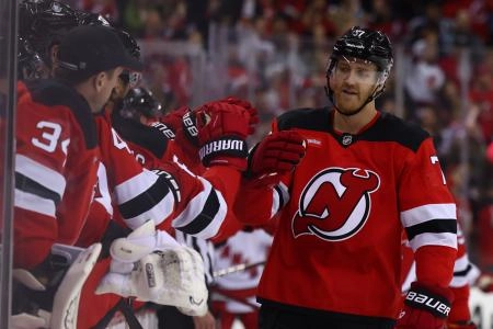 Nov 21, 2024; Newark, New Jersey, USA; New Jersey Devils defenseman Dougie Hamilton (7) celebrates his goal against the Carolina Hurricanes during the third period at Prudential Center. Mandatory Credit: Ed Mulholland-Imagn Images