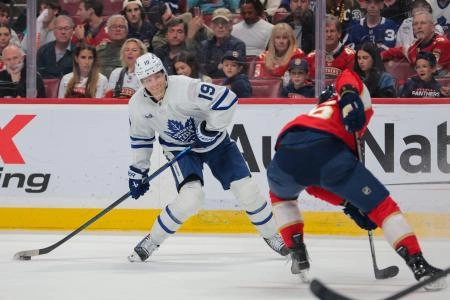Toronto Maple Leafs forward Calle Jarnkrok attempting to take a shot on goal against the Florida Panthers.