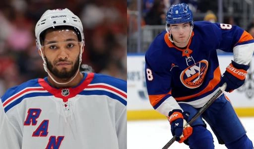 Photo of Noah Dobson and K'Andre Miller Photo of Noah Dobson and K'Andre Miller