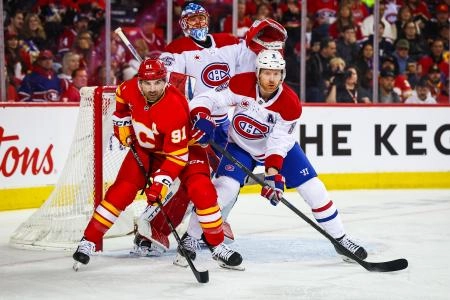 Mar 8, 2025; Calgary, Alberta, CAN; Calgary Flames center Nazem Kadri (91) and Montreal Canadiens defenseman Mike Matheson (8) fights for position in front of Montreal Canadiens goaltender Jakub Dobes (75) during the second period at Scotiabank Saddledome. Mandatory Credit: Sergei Belski-Imagn Images Mar 8, 2025; Calgary, Alberta, CAN; Calgary Flames center Nazem Kadri (91) and Montreal Canadiens defenseman Mike Matheson (8) fights for position in front of Montreal Canadiens goaltender Jakub Dobes (75) during the second period at Scotiabank Saddledome. Mandatory Credit: Sergei Belski-Imagn Images