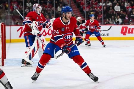 Feb 8, 2025; Montreal, Quebec, CAN; Montreal Canadiens defenseman Logan Mailloux (24) defends against the New Jersey Devils during the first period at Bell Centre. Feb 8, 2025; Montreal, Quebec, CAN; Montreal Canadiens defenseman Logan Mailloux (24) defends against the New Jersey Devils during the first period at Bell Centre.