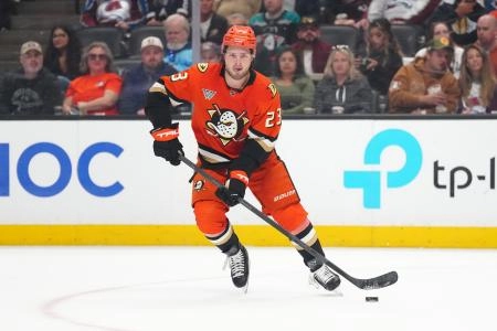 Apr 13, 2025; Anaheim, California, USA; Anaheim Ducks center Mason McTavish (23) skates with the puck against the Colorado Avalanche in the first period at Honda Center.