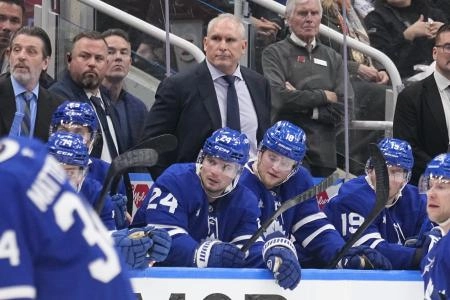Apr 20, 2025; Toronto, Ontario, CAN; Toronto Maple Leafs head coach Craig Berube (center) watches the action during the third period of game one of the first round of the 2025 Stanley Cup Playoffs against the Ottawa Senators at Scotiabank Arena. Mandatory Credit: John E. Sokolowski-Imagn Images