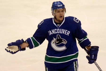 Matt Cooke playing for the Vancouver Canucks. Matt Cooke playing for the Vancouver Canucks.
