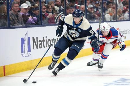:Mar 15, 2025; Columbus, Ohio, USA; Columbus Blue Jackets right wing Yegor Chinakhov (59) controls the puck as New York Rangers defenseman Urho Vaakanainen (18) defends during the second period at Nationwide Arena. Mandatory Credit: Joseph Maiorana-Imagn Images :Mar 15, 2025; Columbus, Ohio, USA; Columbus Blue Jackets right wing Yegor Chinakhov (59) controls the puck as New York Rangers defenseman Urho Vaakanainen (18) defends during the second period at Nationwide Arena. Mandatory Credit: Joseph Maiorana-Imagn Images