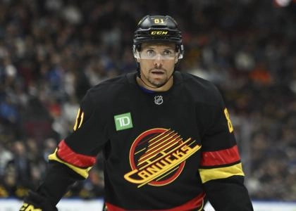 Mar 5, 2025; Vancouver, British Columbia, CAN; Vancouver Canucks forward Dakota Joshua (81) waits for the start of play Anaheim Ducks during the second period at Rogers Arena. Mandatory Credit: Simon Fearn-Imagn Images