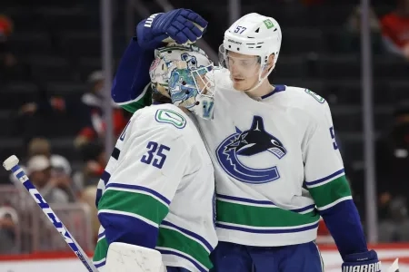 Vancouver Canucks goaltender Thatcher Demko  defenseman Tyler Myers.