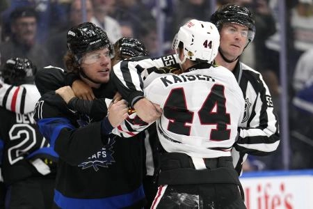 Toronto Maple Leafs forward Nikita Grebenkin tied up with Chicago Blackhawks defensman Wyatt Kaiser. Toronto Maple Leafs forward Nikita Grebenkin tied up with Chicago Blackhawks defensman Wyatt Kaiser.