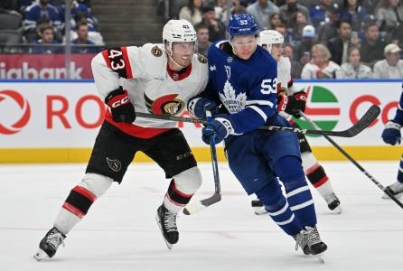 Sep 22, 2024; Toronto, Ontario, CAN; Ottawa Senators defenseman Tyler Kleven (43) covers Toronto Maple Leafs forward Easton Cowan (53) in the third period at Scotiabank Arena