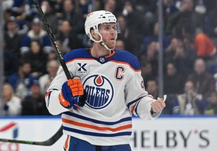 Nov 16, 2024; Toronto, Ontario, CAN; Edmonton Oilers forward Connor McDavid (97) reacts after being called for a minor penalty against the Toronto Maple Leafs in the second period at Scotiabank Arena. Mandatory Credit: Dan Hamilton-Imagn Images