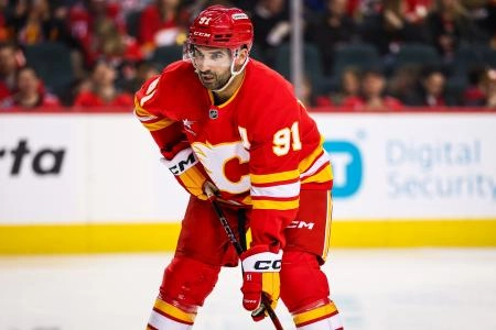 Apr 3, 2025; Calgary, Alberta, CAN; Calgary Flames center Nazem Kadri (91) against the Anaheim Ducks during the second period at Scotiabank Saddledome. Mandatory Credit: Sergei Belski-Imagn Images