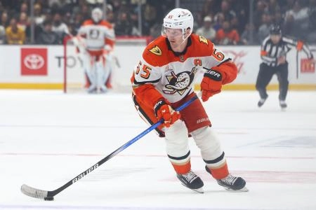 Anaheim Ducks' Jacob Trouba skates with the puck during a hockey game