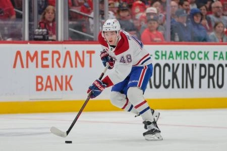 Mar 30, 2025; Sunrise, Florida, USA; Montreal Canadiens defenseman Lane Hutson (48) moves the puck against the Florida Panthers during the first period at Amerant Bank Arena. Mandatory Credit: Sam Navarro-Imagn Images Mar 30, 2025; Sunrise, Florida, USA; Montreal Canadiens defenseman Lane Hutson (48) moves the puck against the Florida Panthers during the first period at Amerant Bank Arena. Mandatory Credit: Sam Navarro-Imagn Images