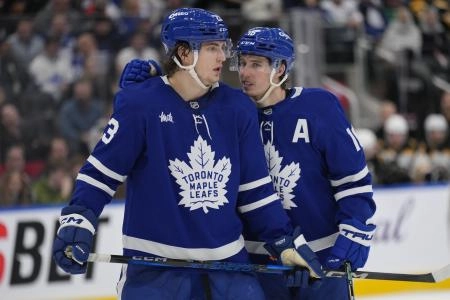 Jan 4, 2025; Toronto, Ontario, CAN; Toronto Maple Leafs forward Mitch Marner (16) talks to forward Matthew Knies (23) during a break in the action against the Boston Bruins during the third period at Scotiabank Arena. Mandatory Credit: John E. Sokolowski-Imagn Images Jan 4, 2025; Toronto, Ontario, CAN; Toronto Maple Leafs forward Mitch Marner (16) talks to forward Matthew Knies (23) during a break in the action against the Boston Bruins during the third period at Scotiabank Arena. Mandatory Credit: John E. Sokolowski-Imagn Images