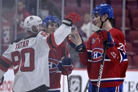 Sep 26, 2022; Montreal, Quebec, CAN; New Jersey Devils forward Tomas Tatar (90) greets Montreal Canadiens forward Juraj Slafkovsky (20) and forward Filip Mesar (48) after the game at the Bell Centre. Mandatory Credit: Eric Bolte-Imagn Images Sep 26, 2022; Montreal, Quebec, CAN; New Jersey Devils forward Tomas Tatar (90) greets Montreal Canadiens forward Juraj Slafkovsky (20) and forward Filip Mesar (48) after the game at the Bell Centre. Mandatory Credit: Eric Bolte-Imagn Images