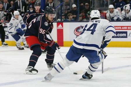Columbus Blue Jackets forward Jack Roslovic attempting to get by Toronto Maple Leafs forward Auston Matthews. Columbus Blue Jackets forward Jack Roslovic attempting to get by Toronto Maple Leafs forward Auston Matthews.