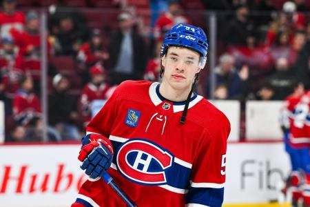 Mar 28, 2024; Montreal, Quebec, CAN; Montreal Canadiens defenseman Jordan Harris (54) looks on during warm-up before the game against the Philadelphia Flyers at Bell Centre. Mandatory Credit: David Kirouac-Imagn Images