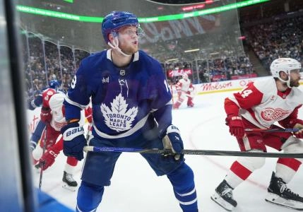 Steven Lorentz battles for a puck in the corner