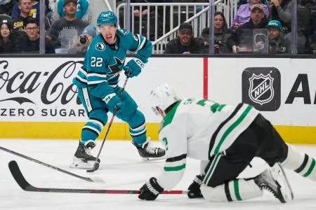 San Jose Sharks' Andrew Poturalski skates with the puck against the Dallas Stars