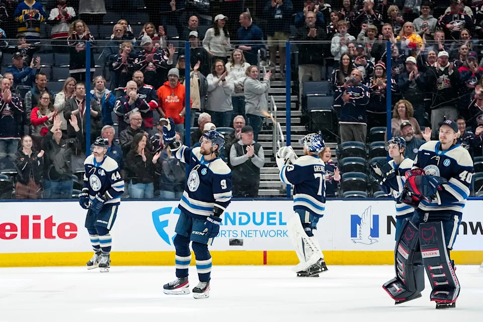 Columbus Blue Jackets players salute the fans following the 6-1 win over the New York Islanders in the team's final NHL hockey game of the season at Nationwide Arena in Columbus on April 17, 2025.