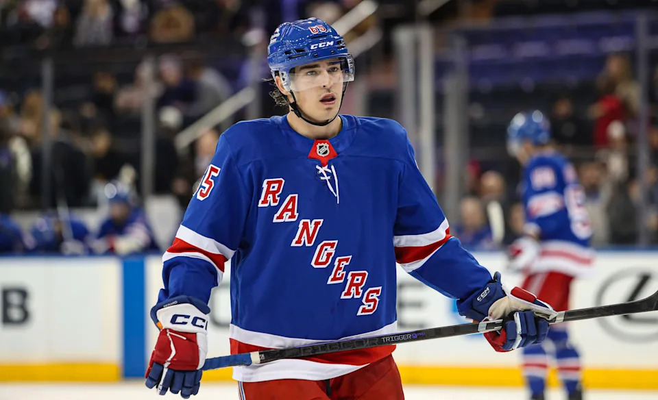 Nov 25, 2024; New York, New York, USA; New York Rangers left wing Brett Berard (65) skates during his NHL debut against the St. Louis Blues during the third period at Madison Square Garden.
