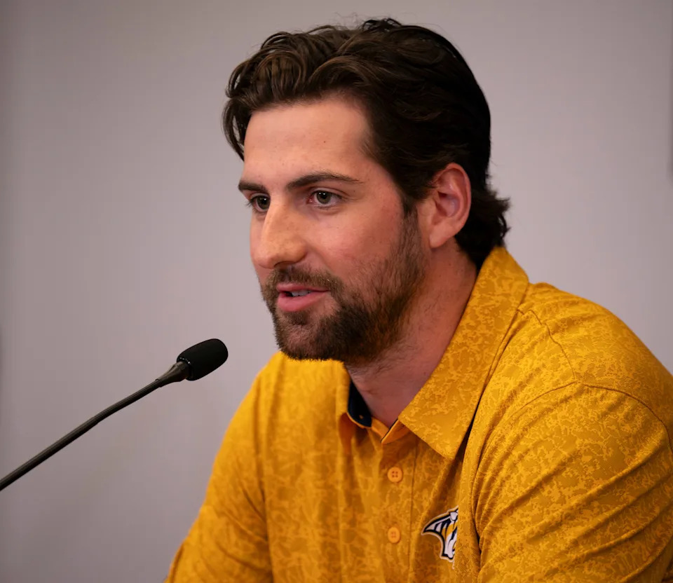 Nashville Predators defenseman Nicolas Hague speaks to the media after being introduced as a recent acquisition of the team at Bridgestone Arena in Nashville, Tenn., Thursday, July 10, 2025.