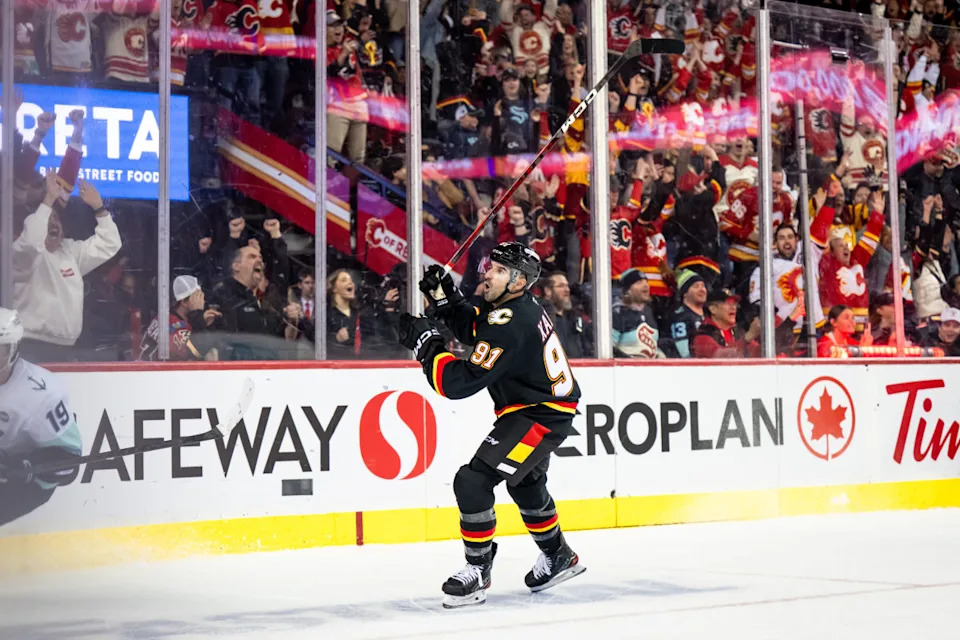 Calgary Flames center Nazem Kadri (91) celebrates after scoring a game-winning goal.Brett Holmes-Imagn Images