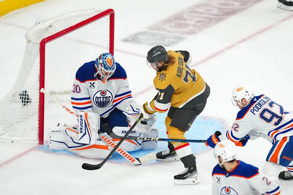 Edmonton Oilers goaltender Calvin Pickard (30) makes a save as Vegas Golden Knights center William Karlsson attempts to deflect the puck during overtime of Game 2 of the teams' second-round playoff series.Stephen R&period; Sylvanie-Imagn Images