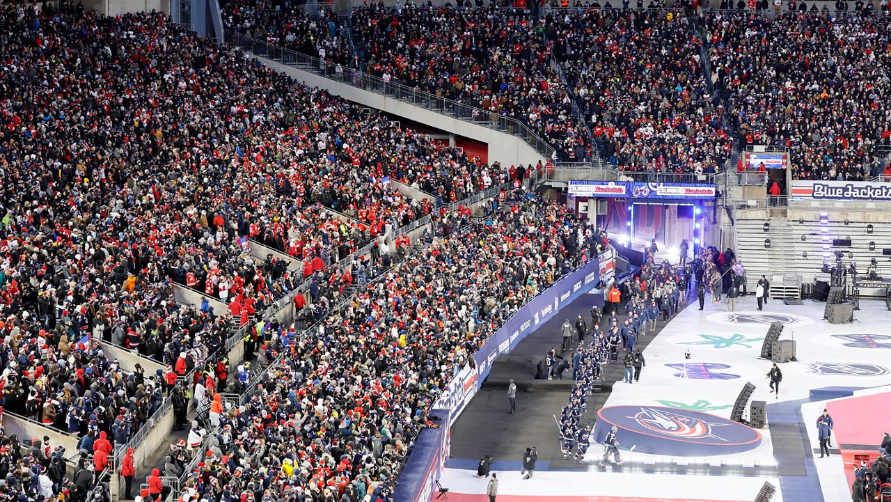 Columbus Blue Jackets' Dmitri Voronkov (10) returns to the bench after scoring during the first period of an NHL hockey game against the Pittsburgh Penguins in Pittsburgh, Tuesday, Jan. 7, 2025. (AP Photo/Gene J. Puskar)