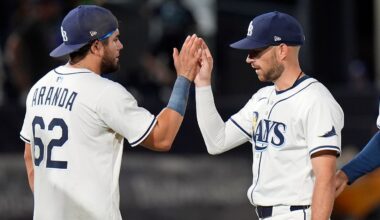 Tampa Bay Rays' Jonathan Aranda (62) celebrates with second base Brandon Lowe after a baseball game against the Texas Rangers Wednesday, June 4, 2025, in Tampa, Fla. (AP Photo/Chris O'Meara)