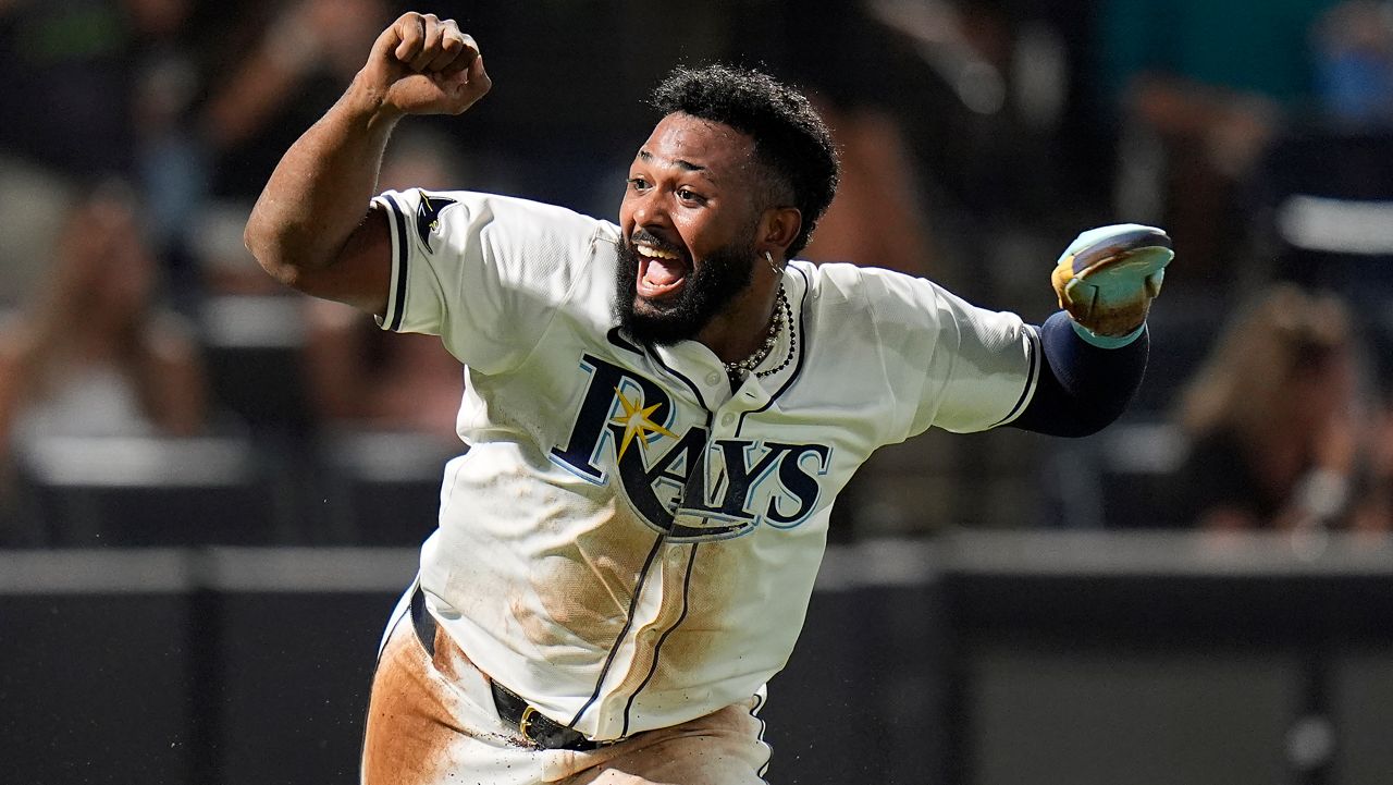Tampa Bay Rays' Junior Caminero reacts after scoring the game-winning run during the ninth inning of a baseball game Thursday, June 5, 2025, in Tampa, Fla. (AP Photo/Chris O'Meara)