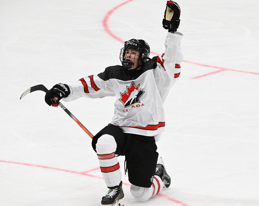 Gavin McKenna of Team Canada celebrats his empty net goal during the 2024 IIHF ice hockey U18 world championships.