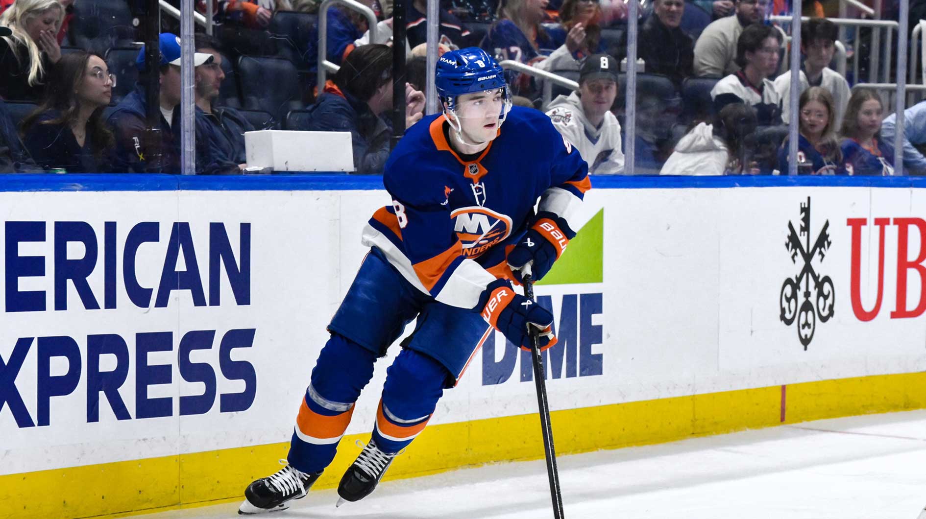 New York Islanders defenseman Noah Dobson (8) skates with the puck during the third period against the Washington Capitals at UBS Arena.