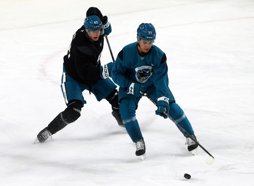 San Jose Sharks' Michael Misa works with Partick Marleau, Joe Thornton