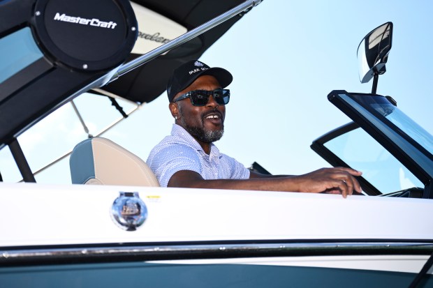 Jimmy Rollins sits in the boat he won for hitting a hole in one on the 12th hole after the second round of the American Century Championship at Edgewood Tahoe Golf Course on July 12, 2025 in Stateline, Nevada. (Photo by Eakin Howard/Getty Images)
