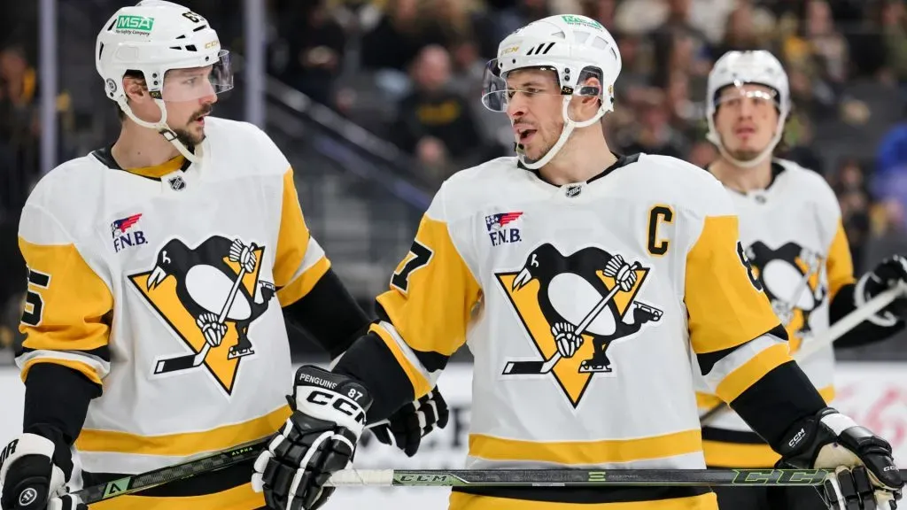 Erik Karlsson #65 and Sidney Crosby #87 of the Pittsburgh Penguins talk as they wait for a faceoff in the second period of a game against the Vegas Golden Knights at T-Mobile Arena on March 07, 2025 in Las Vegas, Nevada. (Photo by Ethan Miller/Getty Images)