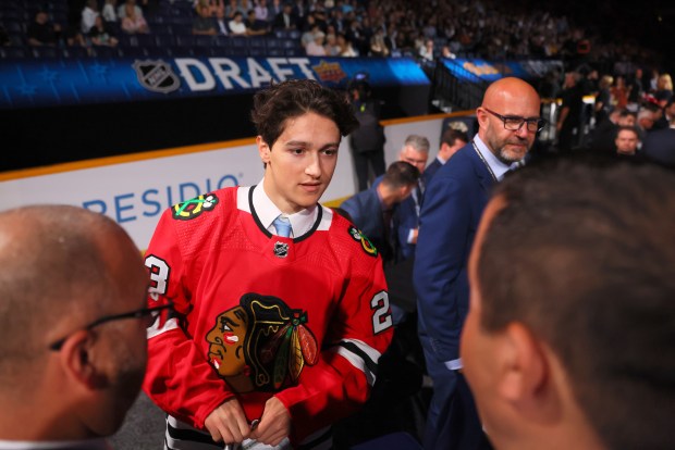 Nick Lardis celebrates after being selected with the 67th pick in the 2023 NHL draft by the Blackhawks at Bridgestone Arena in Nashville, Tenn. (Bruce Bennett/Getty Images)