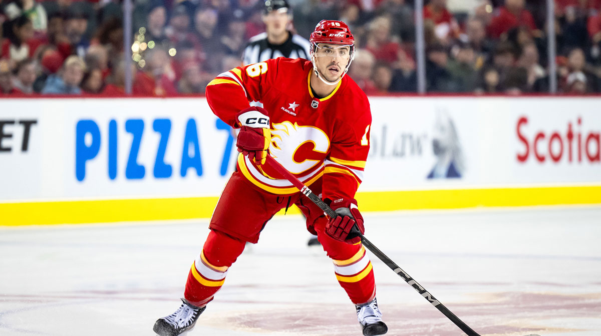 Calgary Flames center Morgan Frost (16) in action against the Vegas Golden Knights during the first period at Scotiabank Saddledome