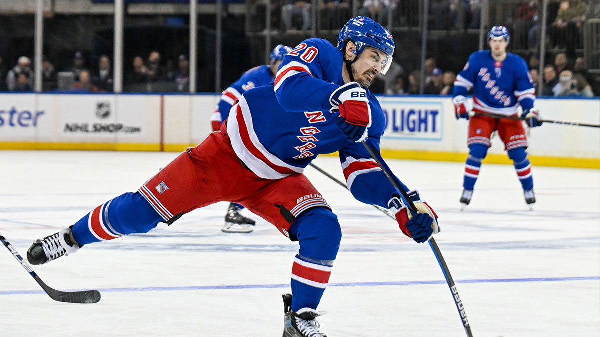New York Rangers left wing Chris Kreider (20) attempts a shot against the Tampa Bay Lightning during the second period at Madison Square Garden. 
