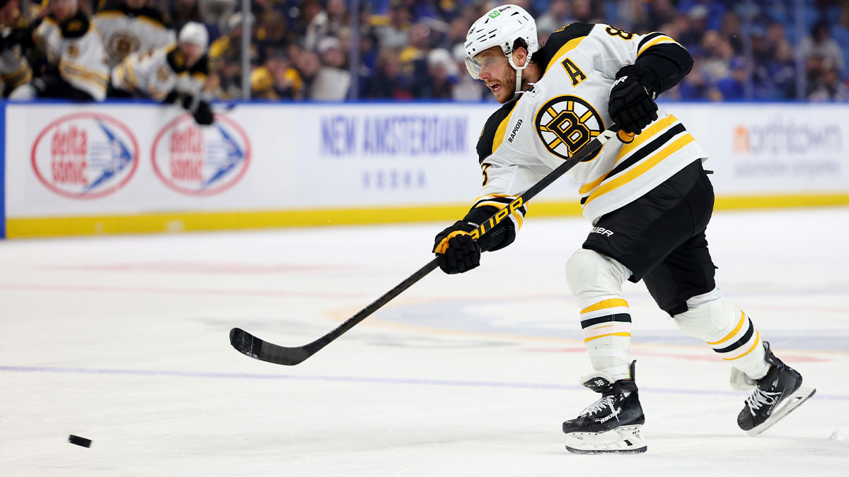 Boston Bruins right wing David Pastrnak (88) takes a shot on goal during the third period against the Buffalo Sabres at KeyBank Center. 