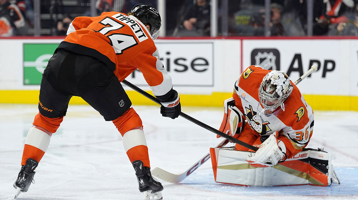 Philadelphia Flyers right wing Owen Tippett (74) reaches in against Anaheim Ducks goalie John Gibson (36) in the third period at Wells Fargo Center. 