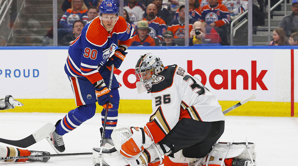 Anaheim Ducks goaltender John Gibson (36) makes a save on on a shot by Edmonton Oilers forward Corey Perry (90) during the first period at Rogers Place. 