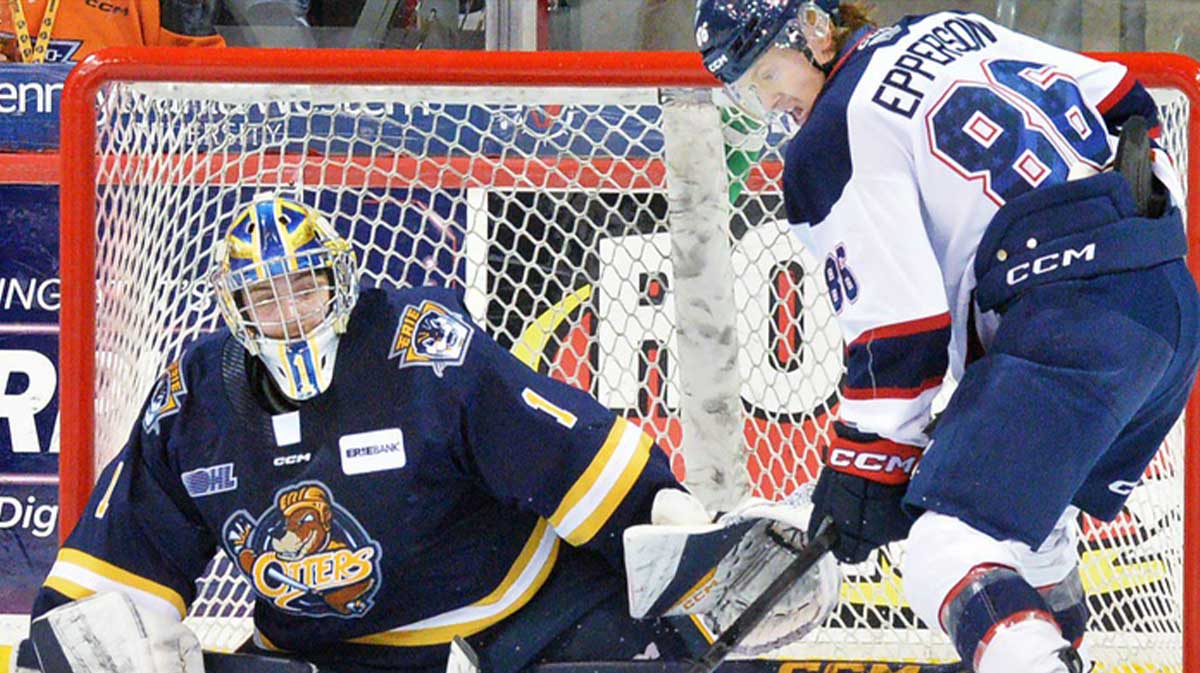 Erie Otters goaltender Noah Erliden stops a shot by Saginaw Spirit Kristian Epperson during an Ontario Hockey League playoff game at Erie Insurance Arena in Erie on April 1, 2025.