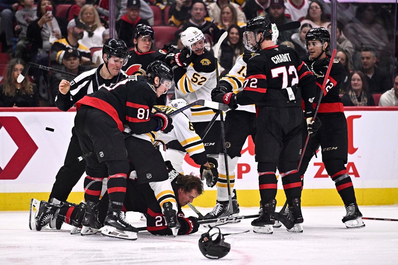 Bruins give up 2 late goals, fall from playoff position with shootout loss