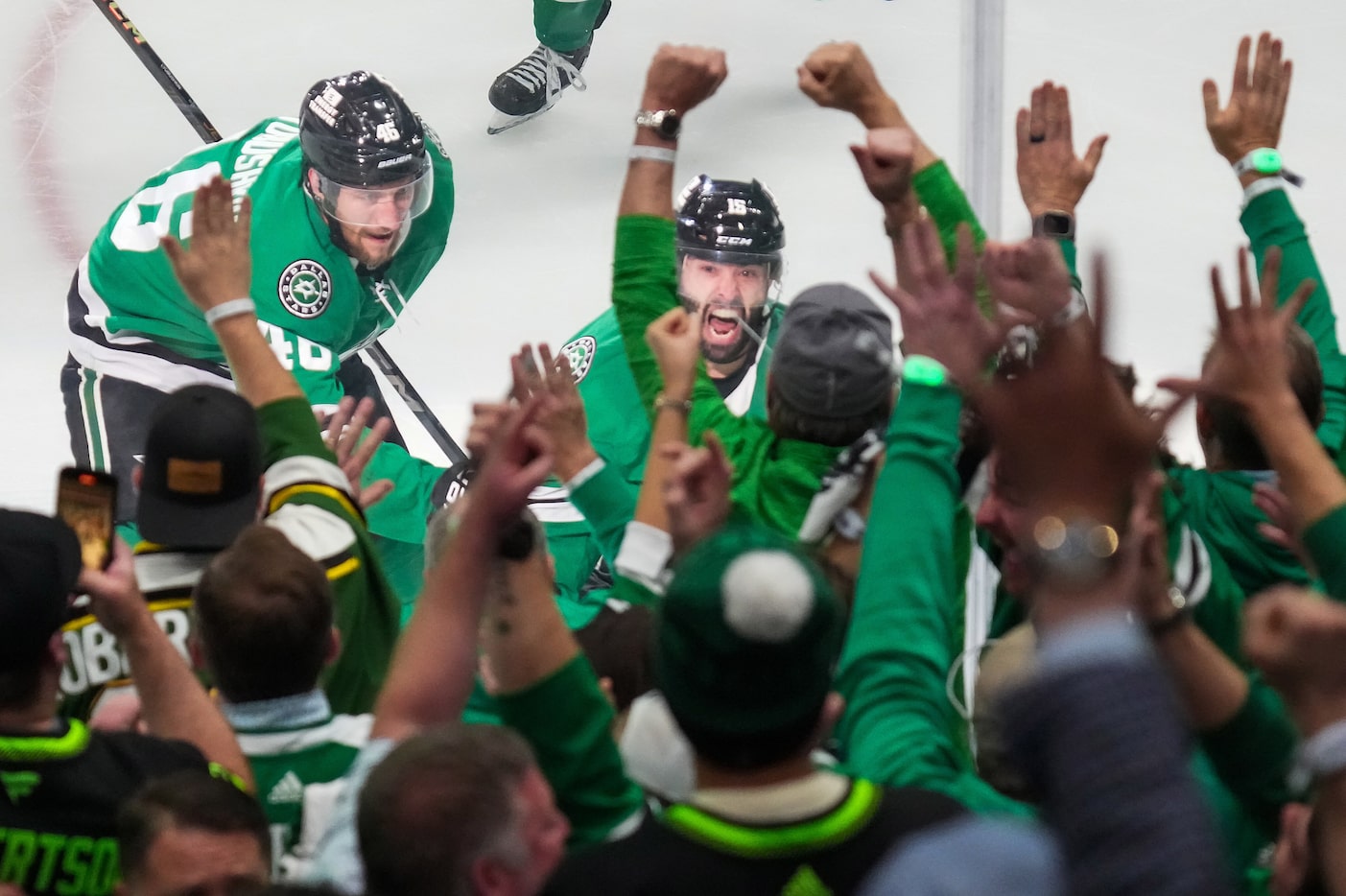 Dallas Stars center Colin Blackwell (15) celebrates with defenseman Ilya Lyubushkin (46)...
