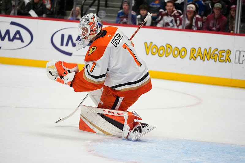 Anaheim Ducks goaltender Lukas Dostal (1) in the first period of an NHL hockey game Friday, Oct. 18, 2024, in Denver. (AP Photo/David Zalubowski)