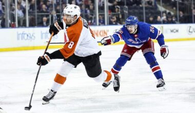 NEW YORK, NEW YORK - APRIL 11: Cam York #8 of the Philadelphia Flyers shoots and scores a goal ahead of Kaapo Kakko #24 of the New York Rangers during the first period at Madison Square Garden on April 11, 2024 in New York City.