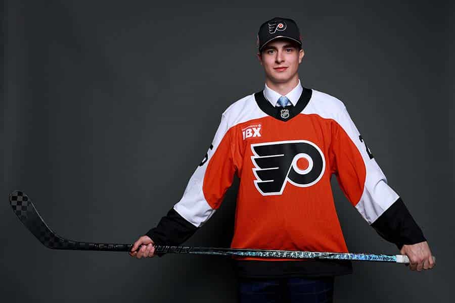 LOS ANGELES, CALIFORNIA - JUNE 27: Porter Martone poses for a portrait after being drafted by the Philadelphia Flyers with the sixth overall pick during the first round of the 2025 Upper Deck NHL Draft at JW Marriott Los Angeles L.A. LIVE on June 27, 2025 in Los Angeles, California.