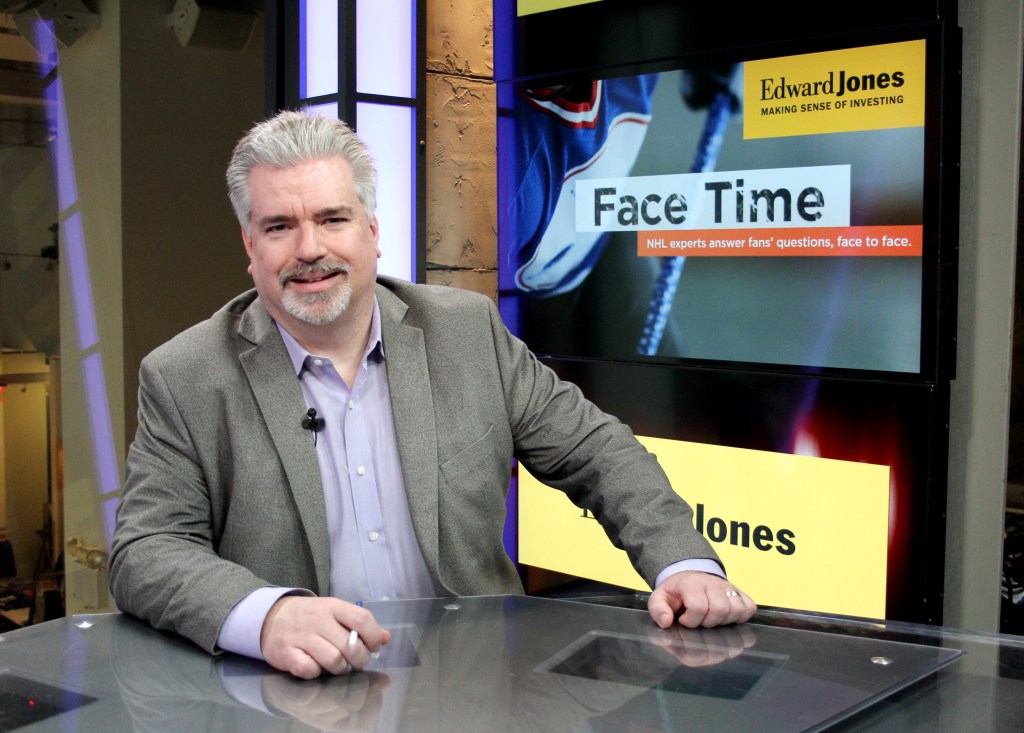 Don La Greca, the host of the Edward Jones Face Time program, poses for photos in the studio at the NHL Powered by Reebok Store