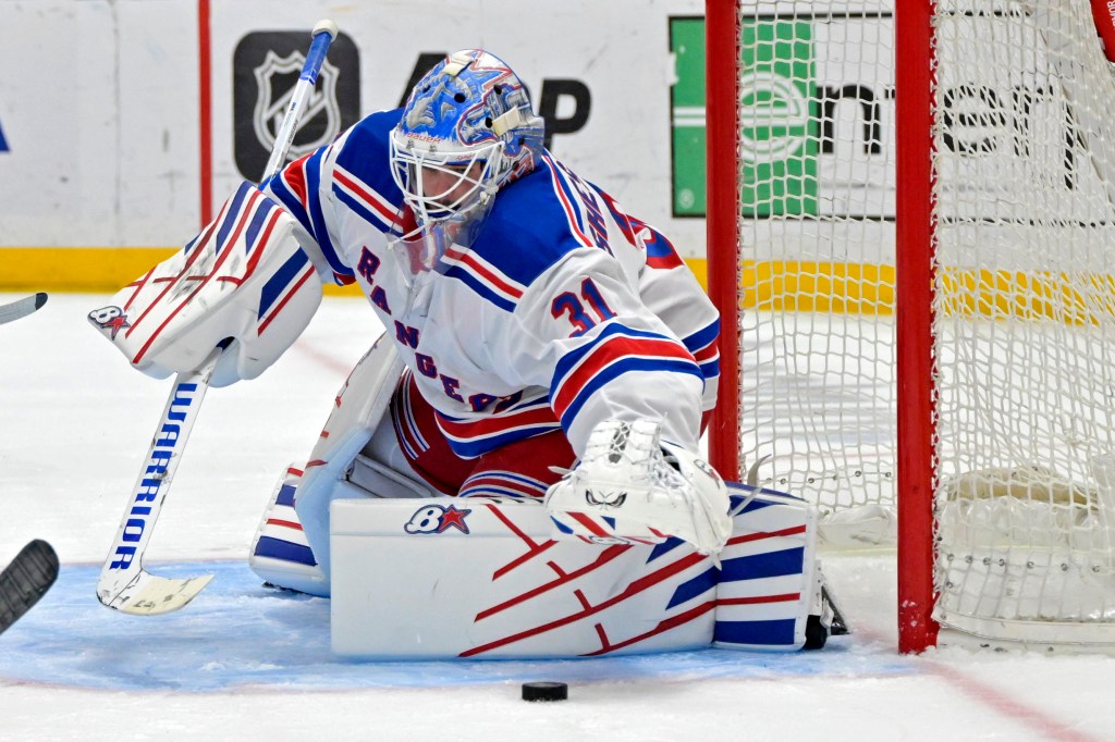Igor Shesterkin makes ones of his 30 saves during the Rangers' loss to the Kings.